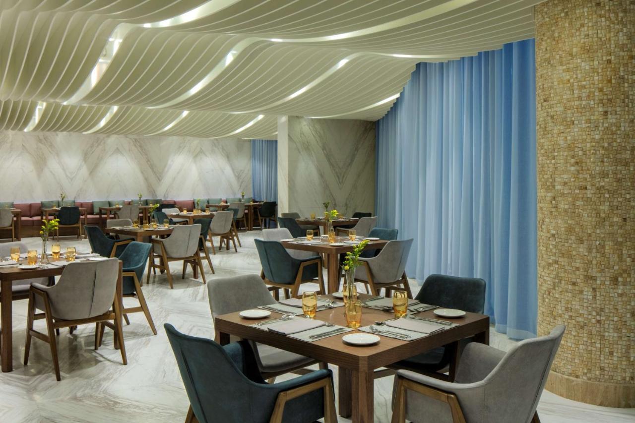 Radisson Blu Hotel Apartment Dubai Silicon Oasis Екстер'єр фото